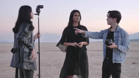 Free Stock Video Young Photographer Giving Directions At A Photoshoot Live Wallpaper - Free Live Wallpaper