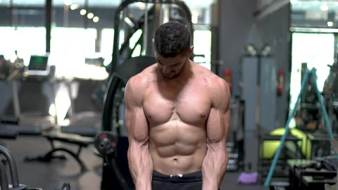 Free Stock Video Young Man Working Out With A Dumbbell In A Gym Live Wallpaper - Free Live Wallpaper