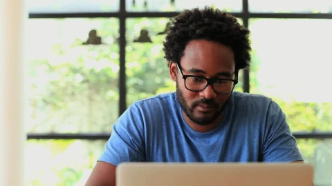 Free Stock Video Young Man Working At Home And Answering A Call Live Wallpaper - Free Live Wallpaper