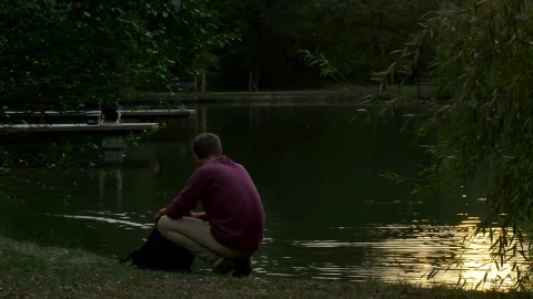 Free Stock Video Young Man Walks Away From A Lake After Appreciating It Live Wallpaper - Free Live Wallpaper