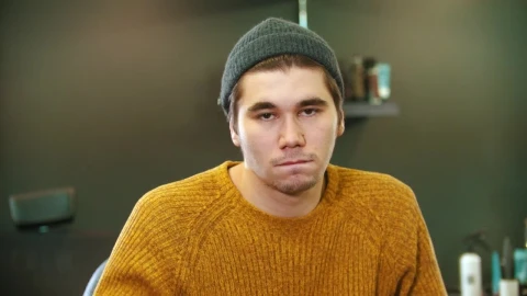 Free Stock Video Young Man Taking Off His Beanie Live Wallpaper - Free Live Wallpaper