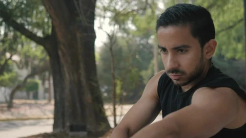 Free Stock Video Young Man Stretching In A Park Before Exercising Live Wallpaper - Free Live Wallpaper