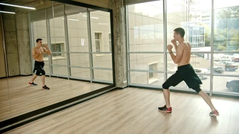 Free Stock Video Young Man Practicing Martial Arts In A Mirror Live Wallpaper - Free Live Wallpaper