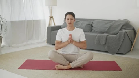Free Stock Video Young Man Meditating At Home Front View Live Wallpaper - Free Live Wallpaper