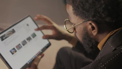 Free Stock Video Young Man Browsing The Internet With A Tablet Live Wallpaper - Free Live Wallpaper