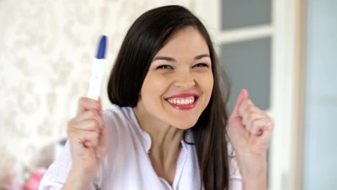 Free Stock Video Young Happy And Excited Woman With A Pregnancy Test Live Wallpaper - Free Live Wallpaper