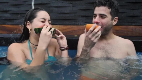 Free Stock Video Young Couple Eating Fruit In The Swimming Pool Live Wallpaper - Free Live Wallpaper