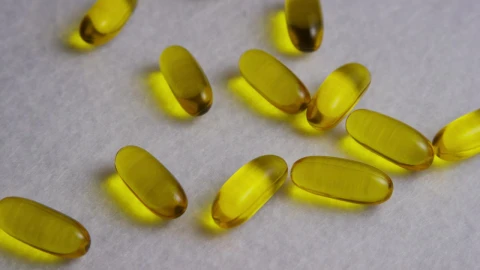 Free Stock Video Yellow Colored Pills Over A Wide Fabric Live Wallpaper - Free Live Wallpaper