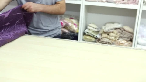 Free Stock Video Worker Measuring A Fabric On A Table Live Wallpaper - Free Live Wallpaper