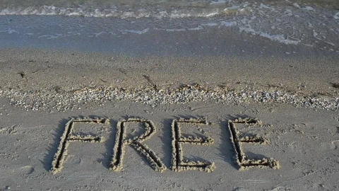 Free Stock Video Word Free Written In The Sand On A Sunny Beach Live Wallpaper - Free Live Wallpaper