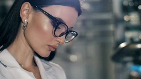 Free Stock Video Woman Working On Tablet In Factory Live Wallpaper - Free Live Wallpaper