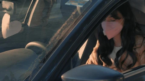 Free Stock Video Woman With A Face Mask Parking A Car Live Wallpaper - Free Live Wallpaper
