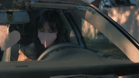 Free Stock Video Woman Wearing A Face Mask Parking Her Car Live Wallpaper - Free Live Wallpaper