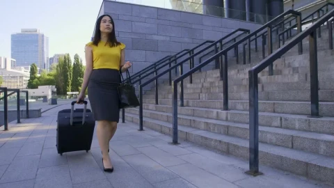 Free Stock Video Woman Walking Down The Street With A Travel Suitcase Live Wallpaper - Free Live Wallpaper