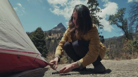 Free Stock Video Woman Tying Her Tent To A Nail Live Wallpaper - Free Live Wallpaper