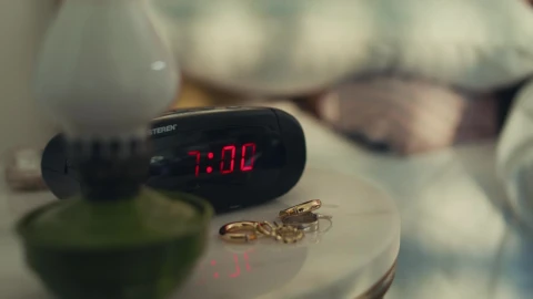Free Stock Video Woman Turning Off Her Alarm Clock Live Wallpaper - Free Live Wallpaper