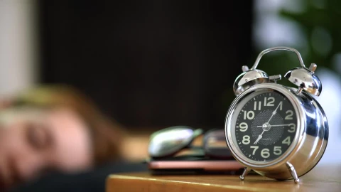 Free Stock Video Woman Turning Off Her Alarm Clock In The Morning Live Wallpaper - Free Live Wallpaper
