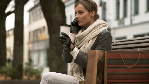 Free Stock Video Woman Talking On The Phone On A Public Bench Live Wallpaper - Free Live Wallpaper