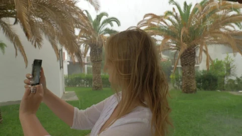 Free Stock Video Woman Taking A Selfie In The Rain Live Wallpaper - Free Live Wallpaper