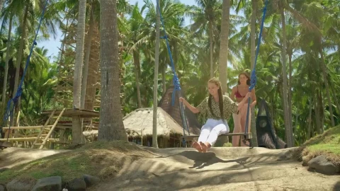 Free Stock Video Woman Swinging Her Friend On The Beach Live Wallpaper - Free Live Wallpaper