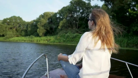 Free Stock Video Woman Sitting On The Front Deck Of The Boat Live Wallpaper - Free Live Wallpaper