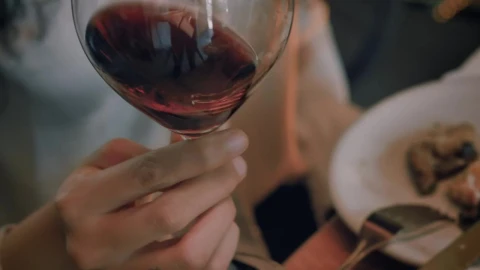 Free Stock Video Woman Shaking A Glass Of Wine Before Drinking From It Live Wallpaper - Free Live Wallpaper