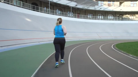 Free Stock Video Woman Running On A Running Track Live Wallpaper - Free Live Wallpaper