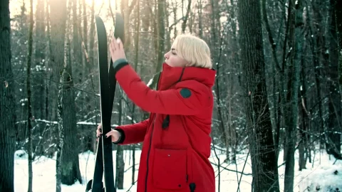 Free Stock Video Woman Removing Snow From Her Ski Live Wallpaper - Free Live Wallpaper