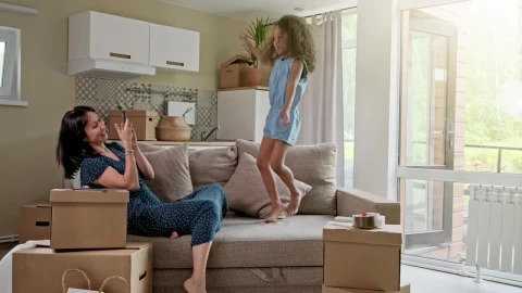 Free Stock Video Woman Records Her Daughter Jumping On The Couch Live Wallpaper - Free Live Wallpaper