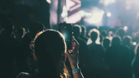 Free Stock Video Woman Recording A Story From A Concert Live Wallpaper - Free Live Wallpaper