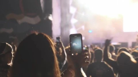Free Stock Video Woman Recording A Concert With Her Smartphone Live Wallpaper - Free Live Wallpaper