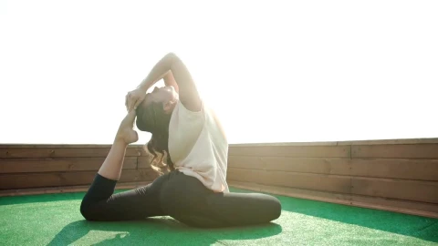 Free Stock Video Woman Practicing Yoga On A Rooftop With City View Live Wallpaper - Free Live Wallpaper