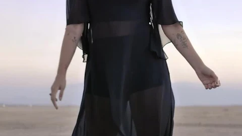 Free Stock Video Woman Posing For The Camera In The Middle Of A Live Wallpaper - Free Live Wallpaper
