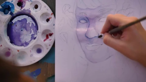 Free Stock Video Woman Painting A Face With Watercolors Live Wallpaper - Free Live Wallpaper