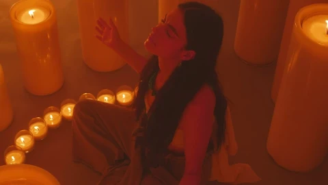 Free Stock Video Woman Meditating Sitting Among Many Candles Live Wallpaper - Free Live Wallpaper