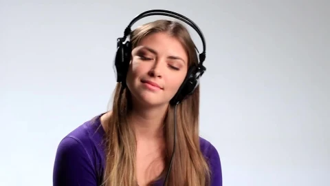 Free Stock Video Woman Listening To Music On Her Headphones Live Wallpaper - Free Live Wallpaper