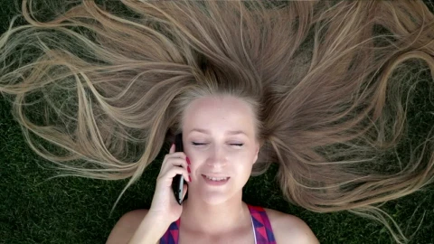 Free Stock Video Woman Laying Down And Talking On The Phone Live Wallpaper - Free Live Wallpaper