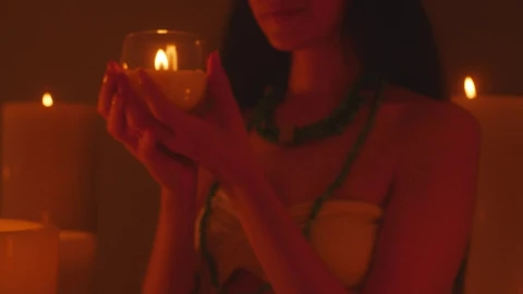 Free Stock Video Woman Laughing Out Loud Looking At A Burning Candle Live Wallpaper - Free Live Wallpaper