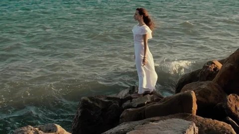 Free Stock Video Woman In White Dress Looking Out To Sea Live Wallpaper - Free Live Wallpaper