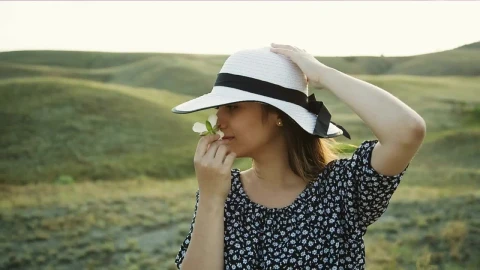 Free Stock Video Woman In The Countryside Smelling A White Flower Live Wallpaper - Free Live Wallpaper
