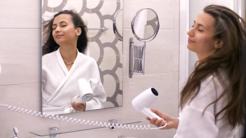 Free Stock Video Woman In Robe Singing Happily In Front Of The Mirror Live Wallpaper - Free Live Wallpaper