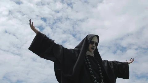 Free Stock Video Woman In Nun Costume On A Cloudy Day Live Wallpaper - Free Live Wallpaper