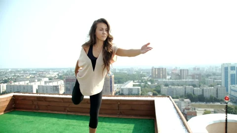 Free Stock Video Woman In Leggings Practicing Yoga In A Rooftop Live Wallpaper - Free Live Wallpaper