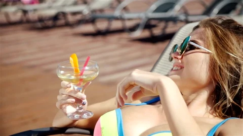 Free Stock Video Woman In Bikini Sunbathing On A Lounge Chair Live Wallpaper - Free Live Wallpaper