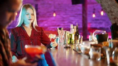 Free Stock Video Woman In A Bar Turns To See A Distracted Man Live Wallpaper - Free Live Wallpaper