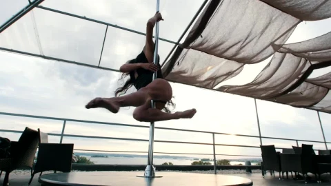 Free Stock Video Woman Giving Twists While Practicing Pole Dance Live Wallpaper - Free Live Wallpaper