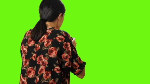 Free Stock Video Woman From Behind Taking A Photo On A Green Background Live Wallpaper - Free Live Wallpaper