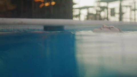 Free Stock Video Woman Floating In Pool Live Wallpaper - Free Live Wallpaper