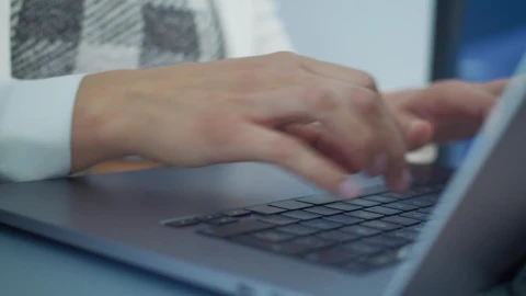 Free Stock Video Woman Finishes Working On Her Computer Live Wallpaper - Free Live Wallpaper