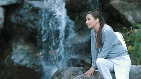 Free Stock Video Woman Enjoying The Shore Of A Waterfall Live Wallpaper - Free Live Wallpaper